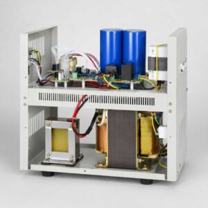 Internal view of JJW regulator showing filter capacitors and transformer coils