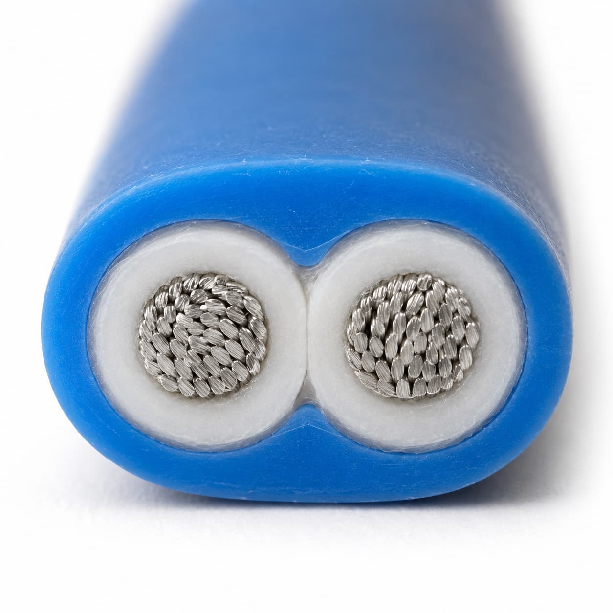 Cross-section of flexible thermocouple wire showing parallel conductors and PTFE jacket