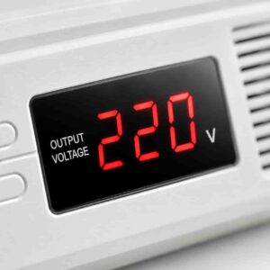 Close-up of TKR regulator LED display showing output voltage