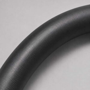 Close-up of flexible black neoprene jacket on reeling cable
