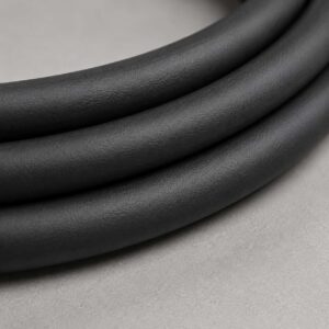 Close-up of black UV-resistant cable jacket surface texture