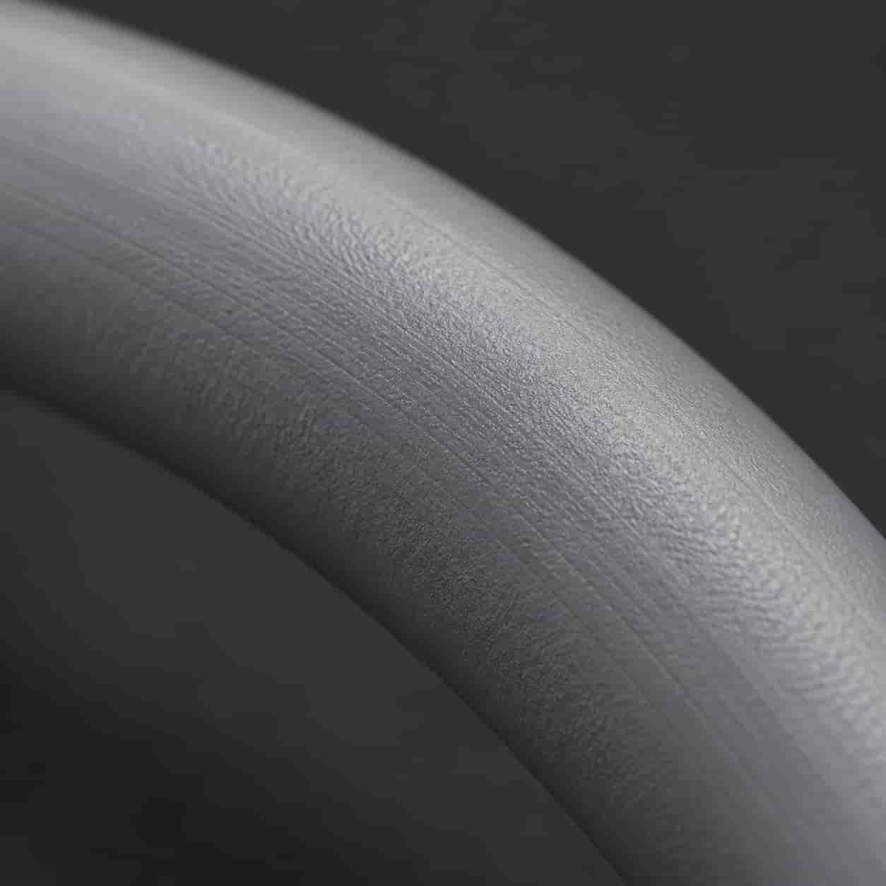Close-up of robot composite cable surface showing TPU sheath texture and low-friction finish