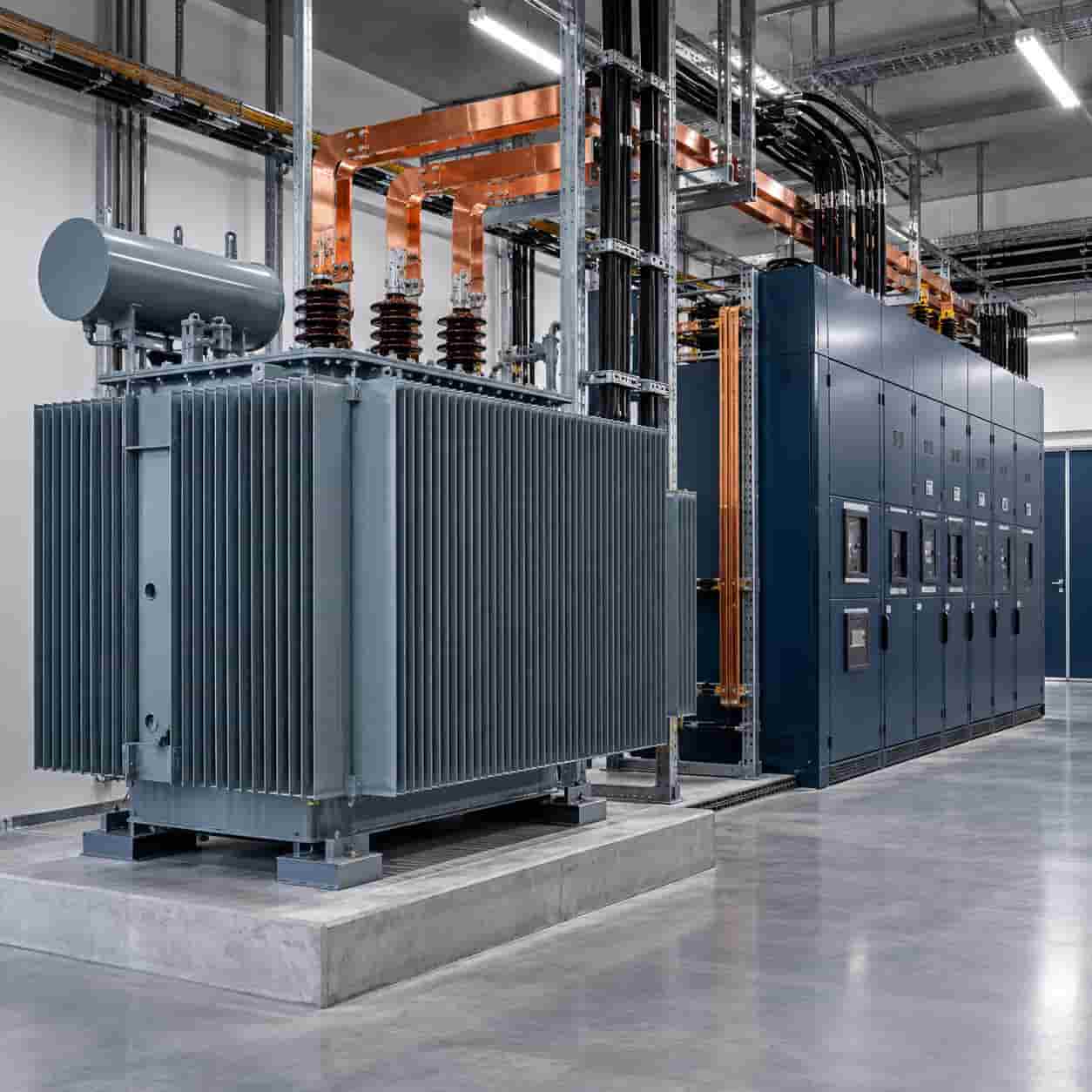 Medium-voltage distribution transformer and switchgear representing project load analysis and transformer capacity sizing